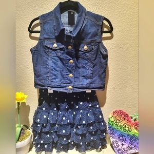 Two piece dark blue denim vest and ruffled polka dot skirt